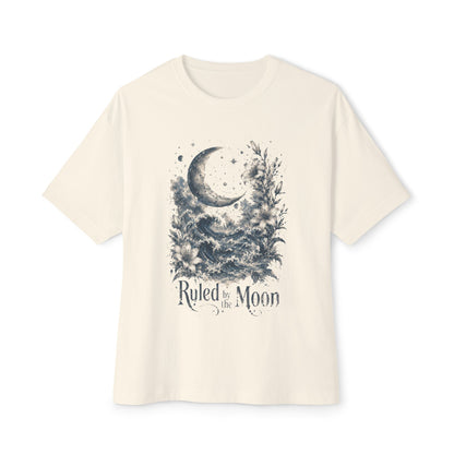 Beige t-shirt with moon and floral design on a white background