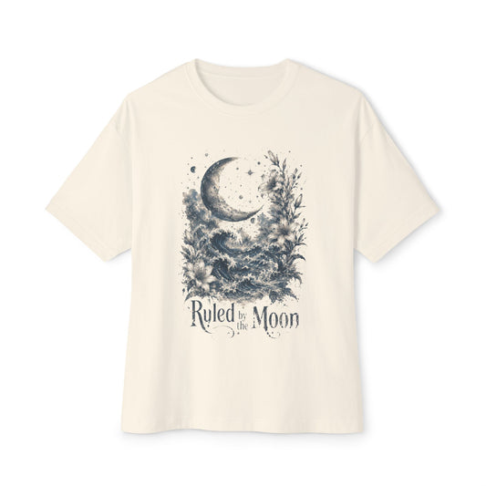 Beige t-shirt with moon and floral design on a white background