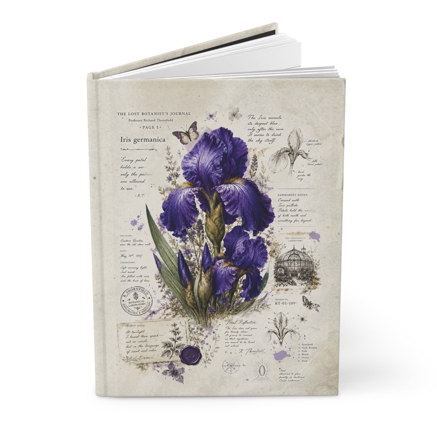 A hardcover journal featuring a vintage-style botanical illustration of purple irises on a cream-colored cover, shown standing upright against a white background.