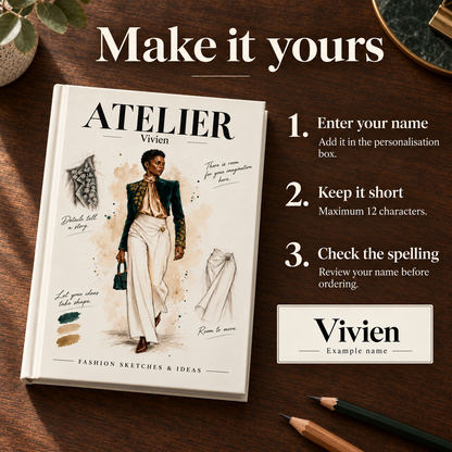 A styled flat-lay of a custom hardcover sketchbook on a dark wood desk, featuring a fashion illustration cover and text overlays explaining personalization options for the name 'Vivien'.