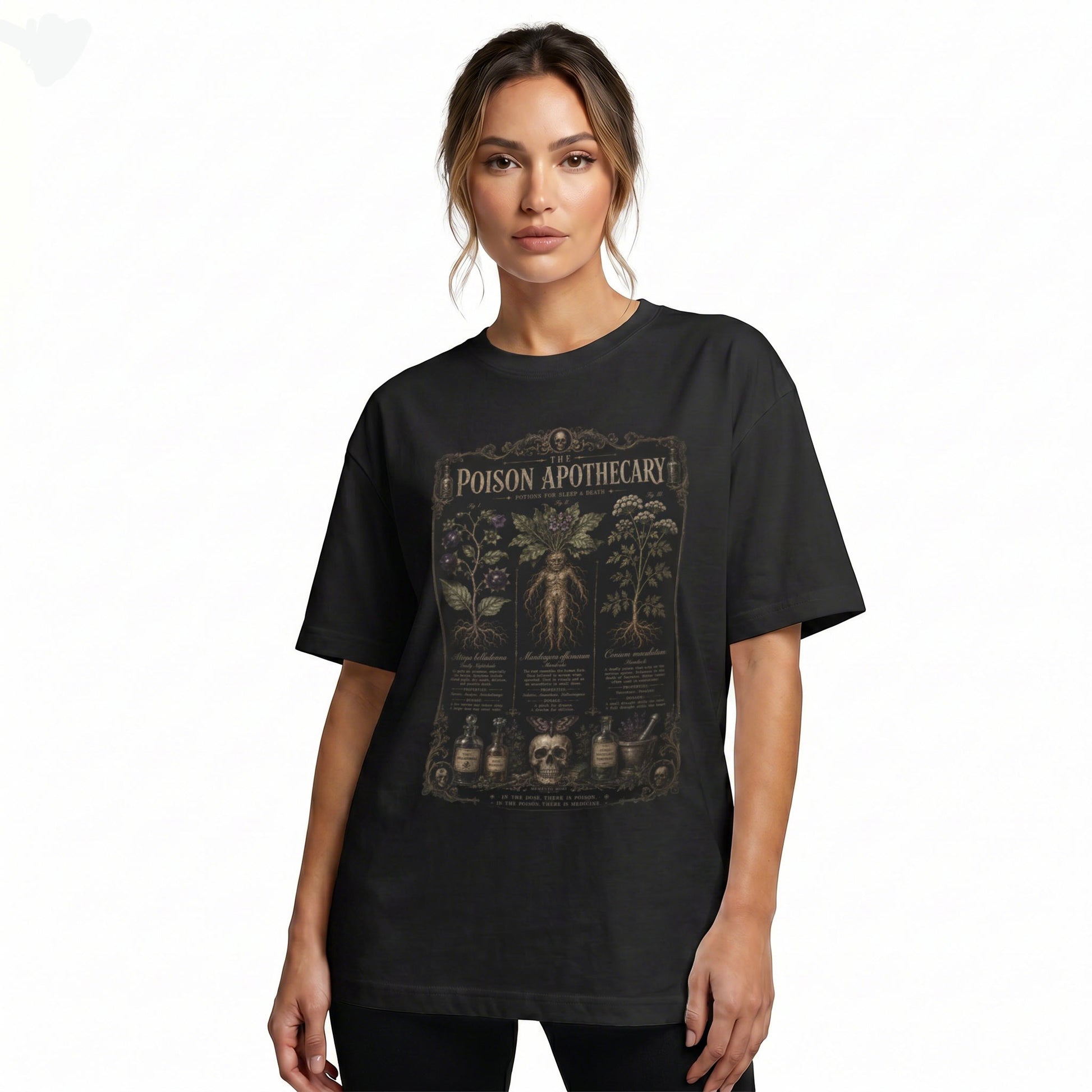 Black oversized t-shirt mockup featuring poison apothecary dark botanical graphic print — front view on neutral background